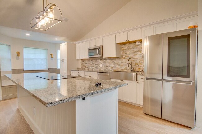 Building Photo - West Pensacola 3BR, 2BA Brick Home Near NAS Pensacola with Screened Porch, Spacious Kitchen & Ope...
