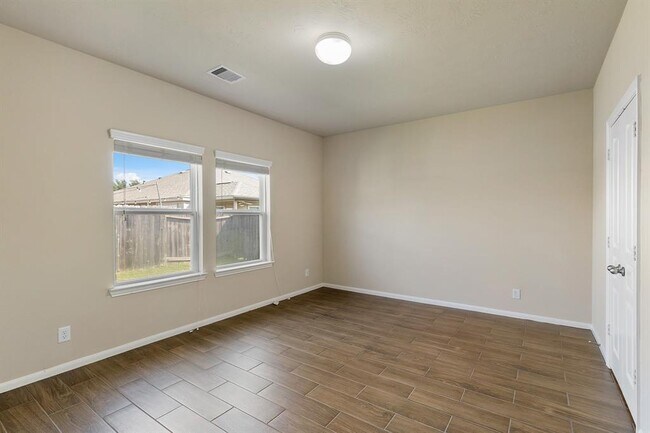 Building Photo - 10903 Woodwind Shadows Dr