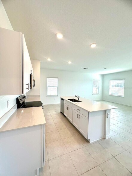 Building Photo - 8795 Coqui Song Ln