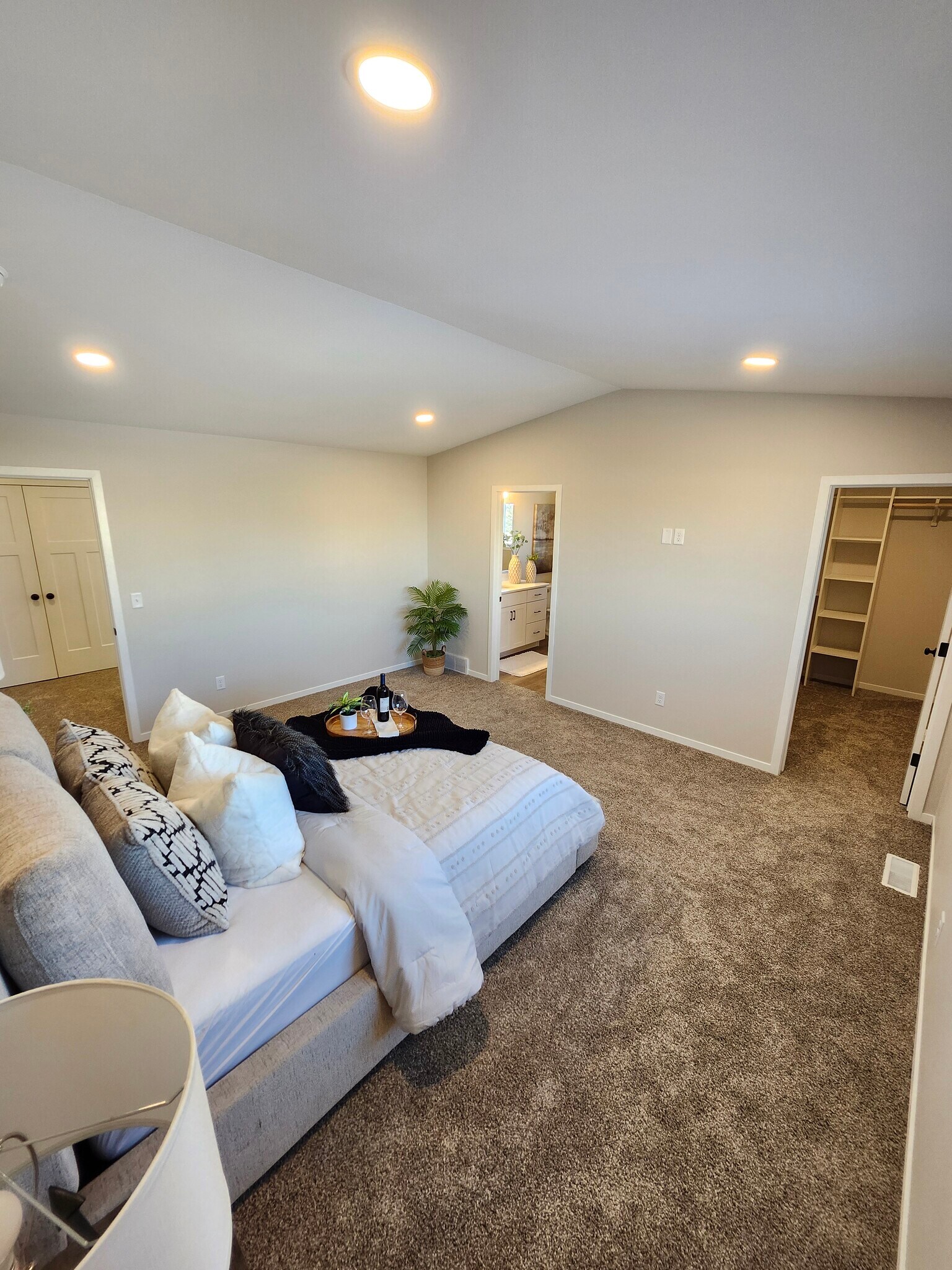 Extra large primary bedroom looking to closet and bathroom - 5316 Welder Ave