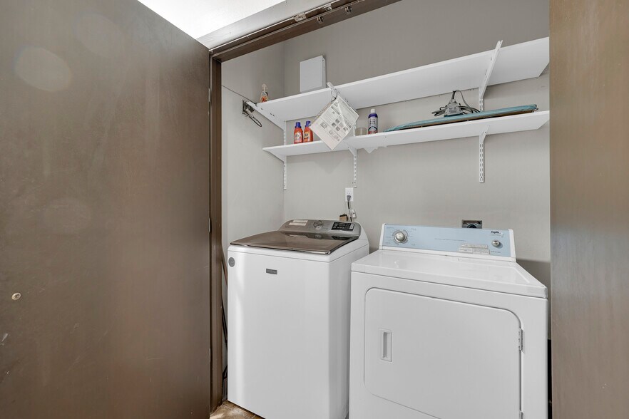 In unit-laundry room. Comes with Washer & Dryer. - 801 E Daffodil