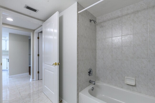 Building Photo - PRICE DROP!! UNFURNISHED ANNUAL RENTAL. CL...