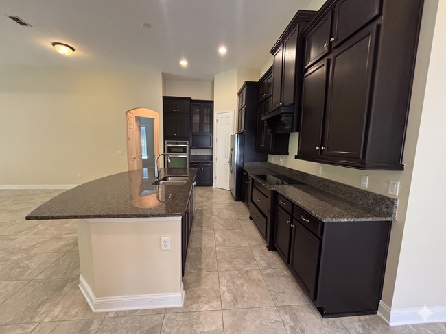 Building Photo - Spacious 4BR/3BA Home with 3-Car Garage, Bonus Office & Covered Patio in St Johns!
