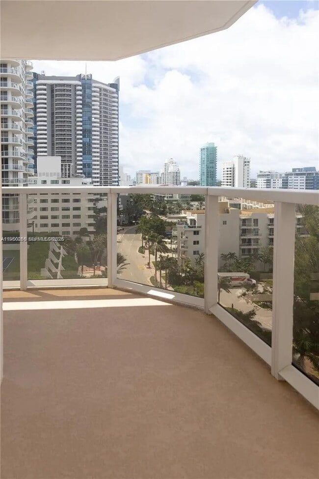 Building Photo - 6423 Collins Ave