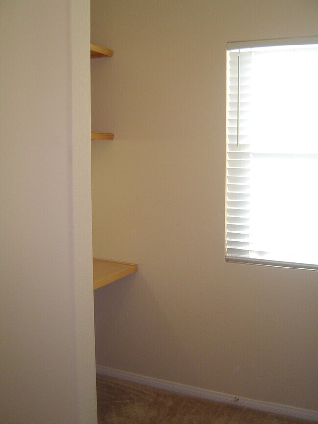 Building Photo - Move-In Ready Condo with Private Balcony & Modern Upgrades