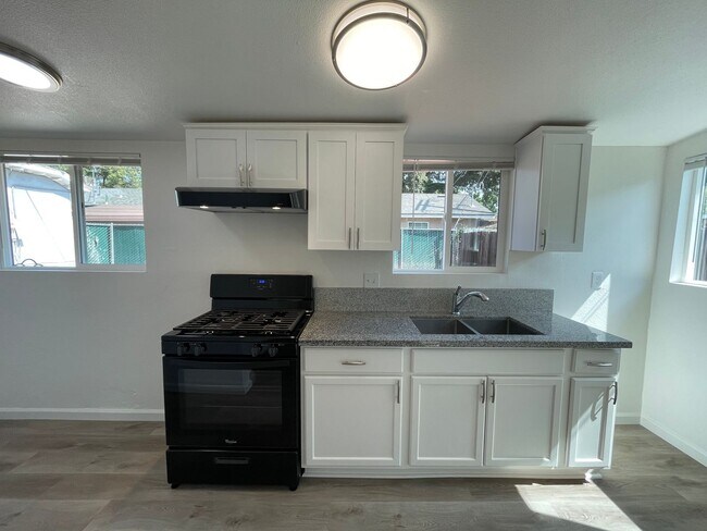 Building Photo - Burney Street Triplex