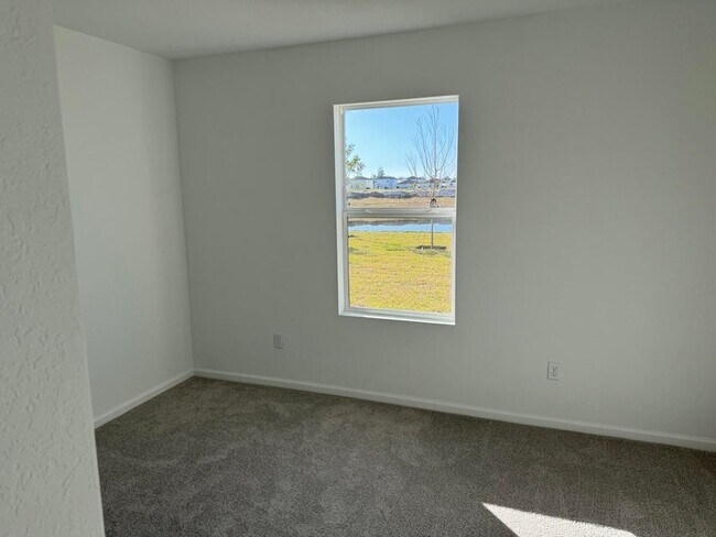 Building Photo - 5892 NW Sweetwood Dr