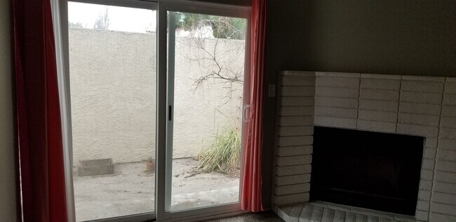 Building Photo - Updated Two Bedroom Condo with Warm Fireplace