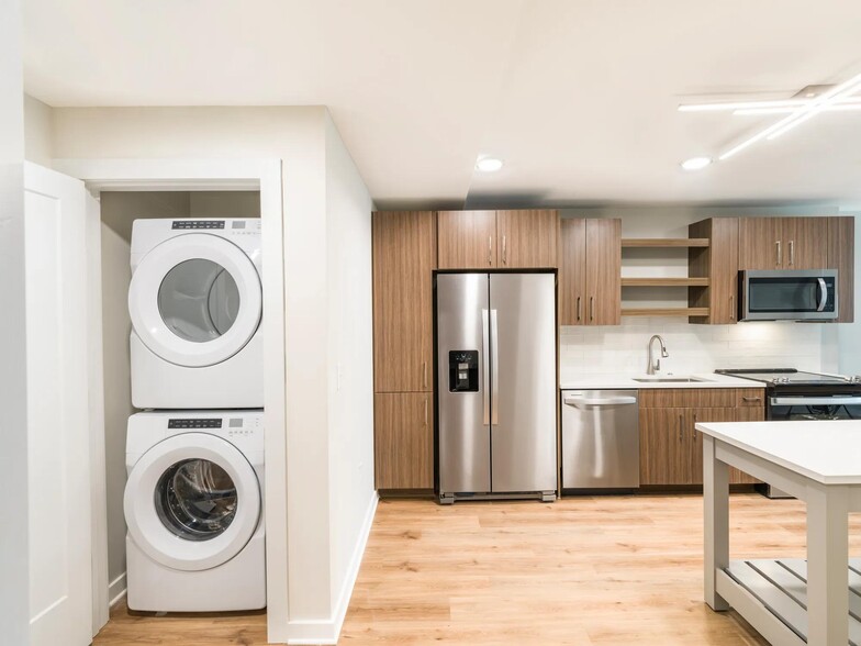 Simplify laundry day with your own full-size washer and dryer at home. - Modera LoSo