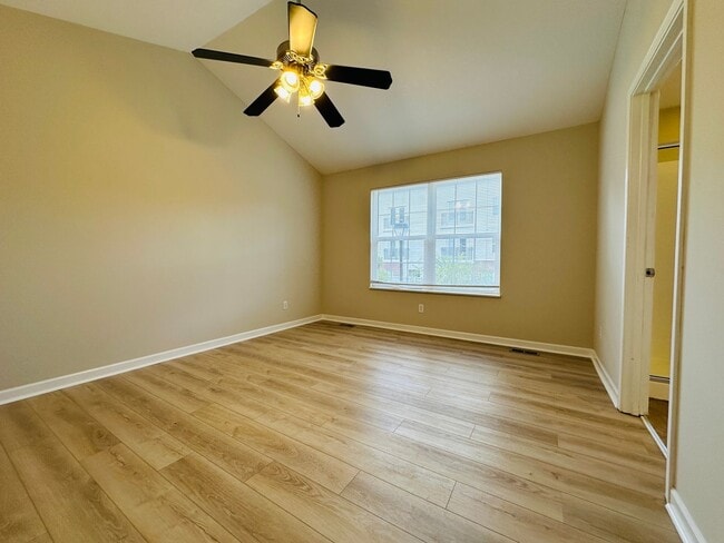 Building Photo - 2 bed, 2.5 bath updated townhouse w/ 1-car garage & Trex deck available now