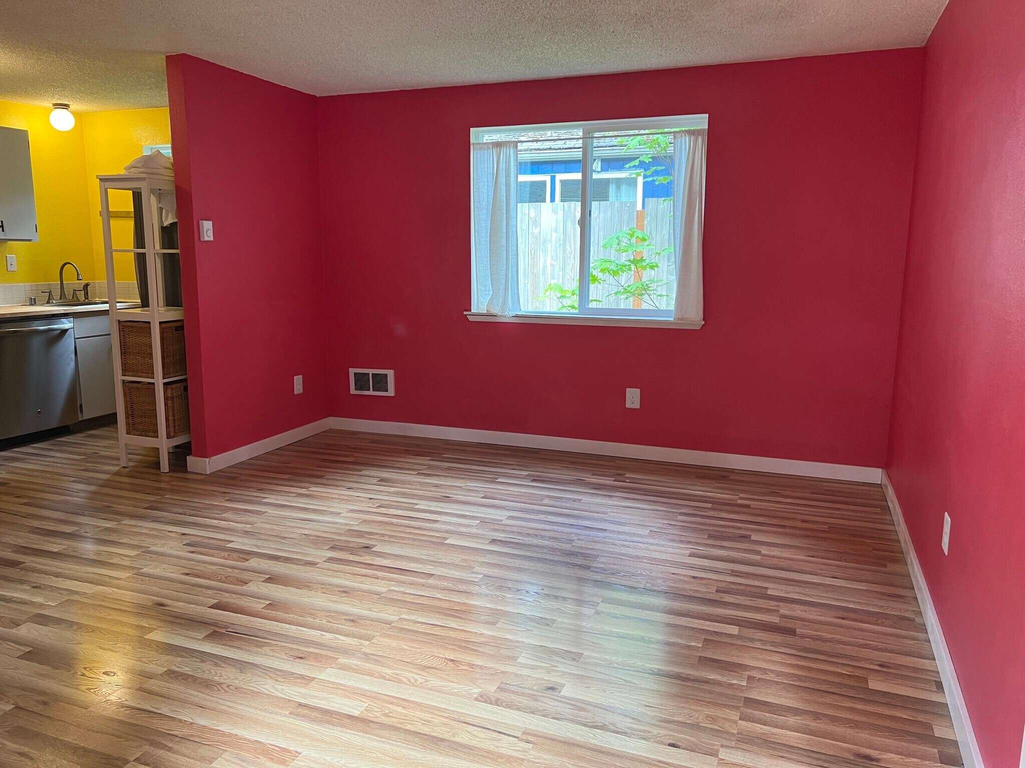 Living room, from the front door. Kitchen is on the left. - 1618 Groves Ave NW