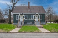 Building Photo - 1427 W 46th Ave