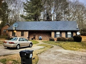 Building Photo - EAST PACES DR - 202/204