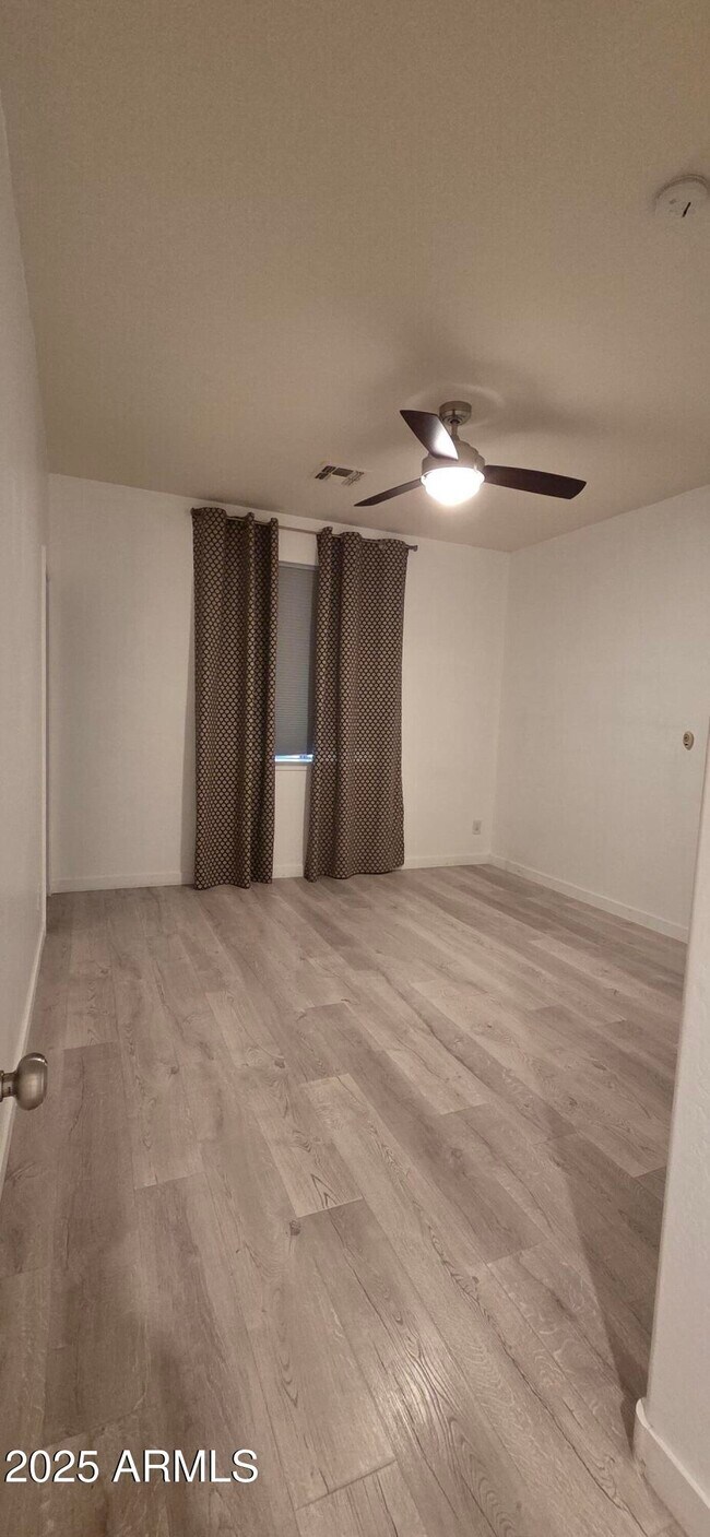 Building Photo - 9418 S 46th Dr