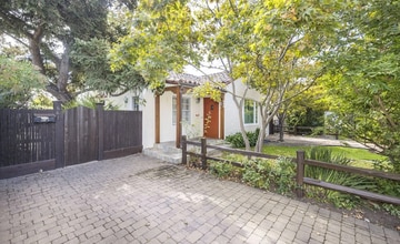 Building Photo - Charming Spanish Style Cottage with Incredible Deck- Gardener's Delight!