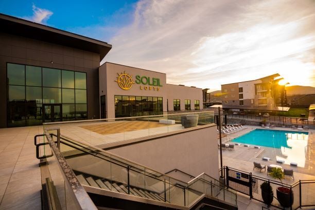 Exquisite View of Outdoor Pool and Sun Deck - Soleil Lofts Apartments