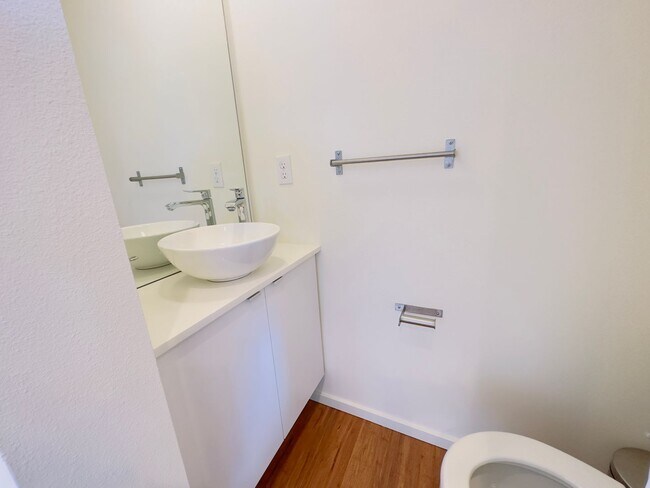 Building Photo - 3 Bedroom Central District Townhome w/ Garage, AC & Rooftop Deck