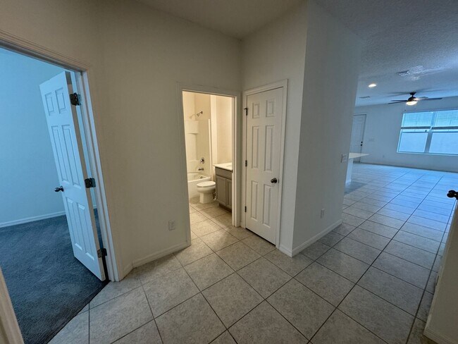 Building Photo - Available Now! Spacious 3-Bedroom Townhome with Fenced Yard in Winter Garden – Washer and Dryer I...