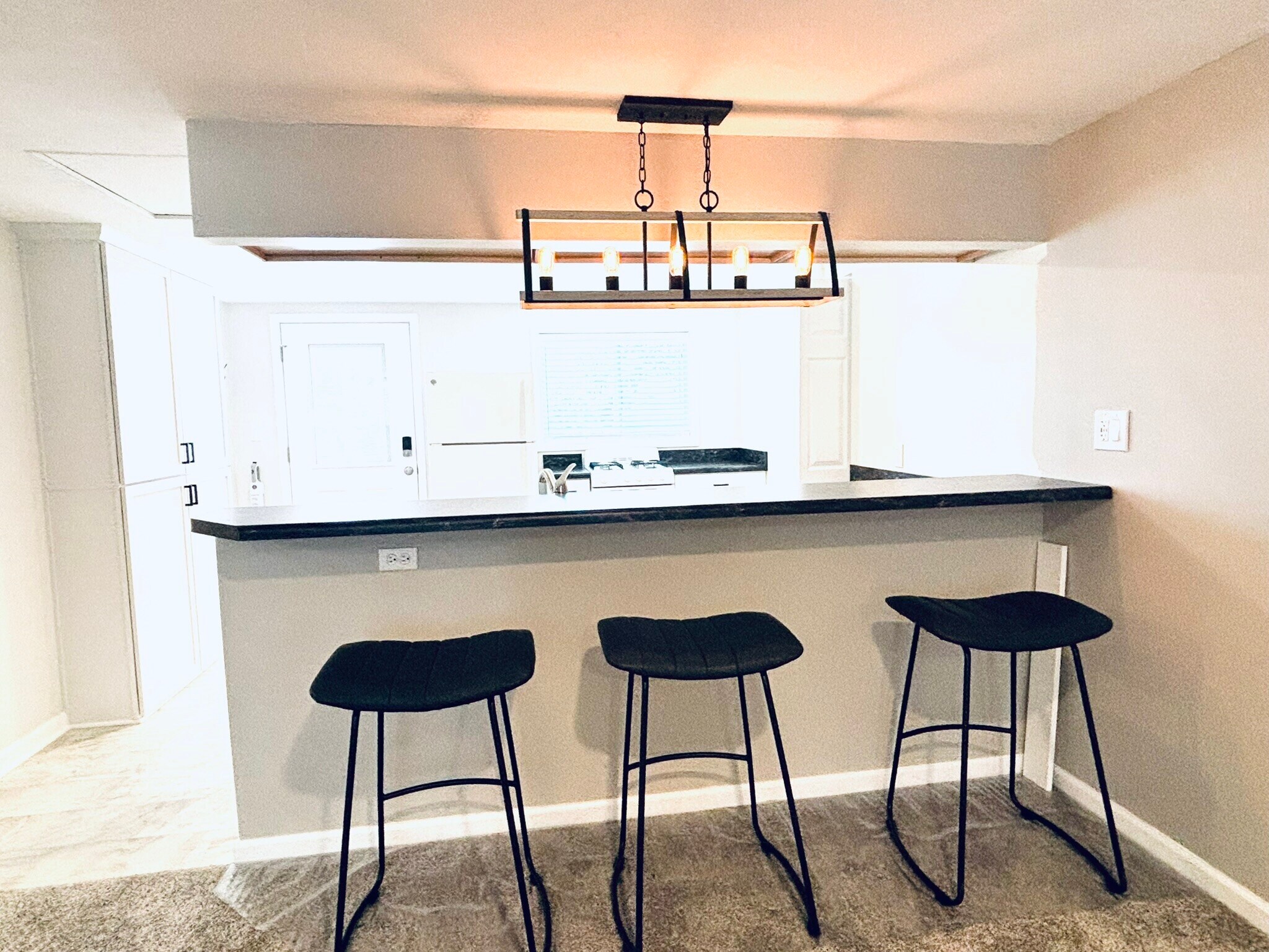 Breakfast bar with barstools - 9841 Cleveland Ave NW