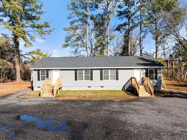 Building Photo - The Home You’ve Been Searching For! *Utilities & Furniture can be added with a rental premium.*