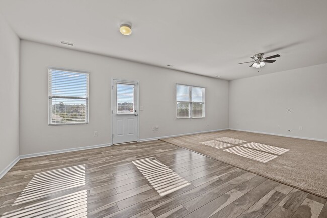 Building Photo - Spacious 5 Bedroom Home with 2-Car Garage,...
