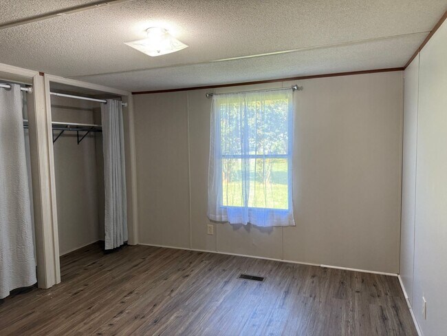 Building Photo - Charming Rural Home with Large Yard & Storage