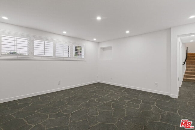 Building Photo - 10527 Le Conte Ave