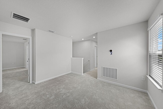 Building Photo - Brand-New 4BR Home with Tile Floors & Quartz Kitchen & Conservation Views