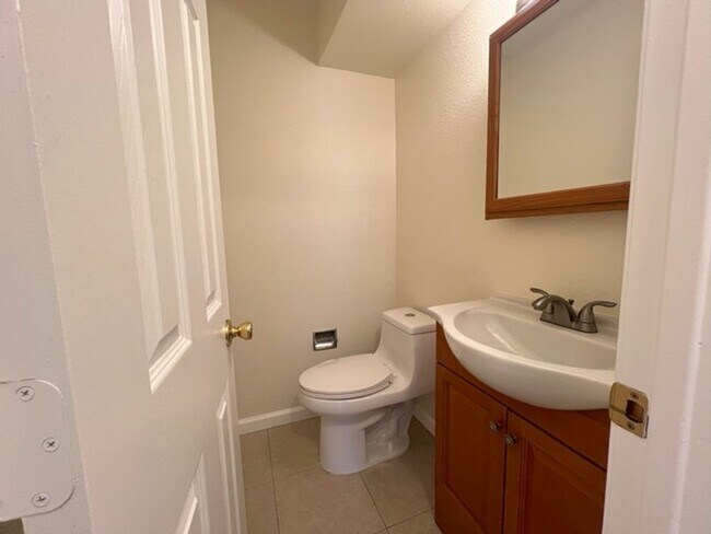 Building Photo - Three Bedroom Two and half Bathroom Tri...