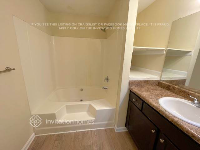 Building Photo - 6712 Songwood Dr