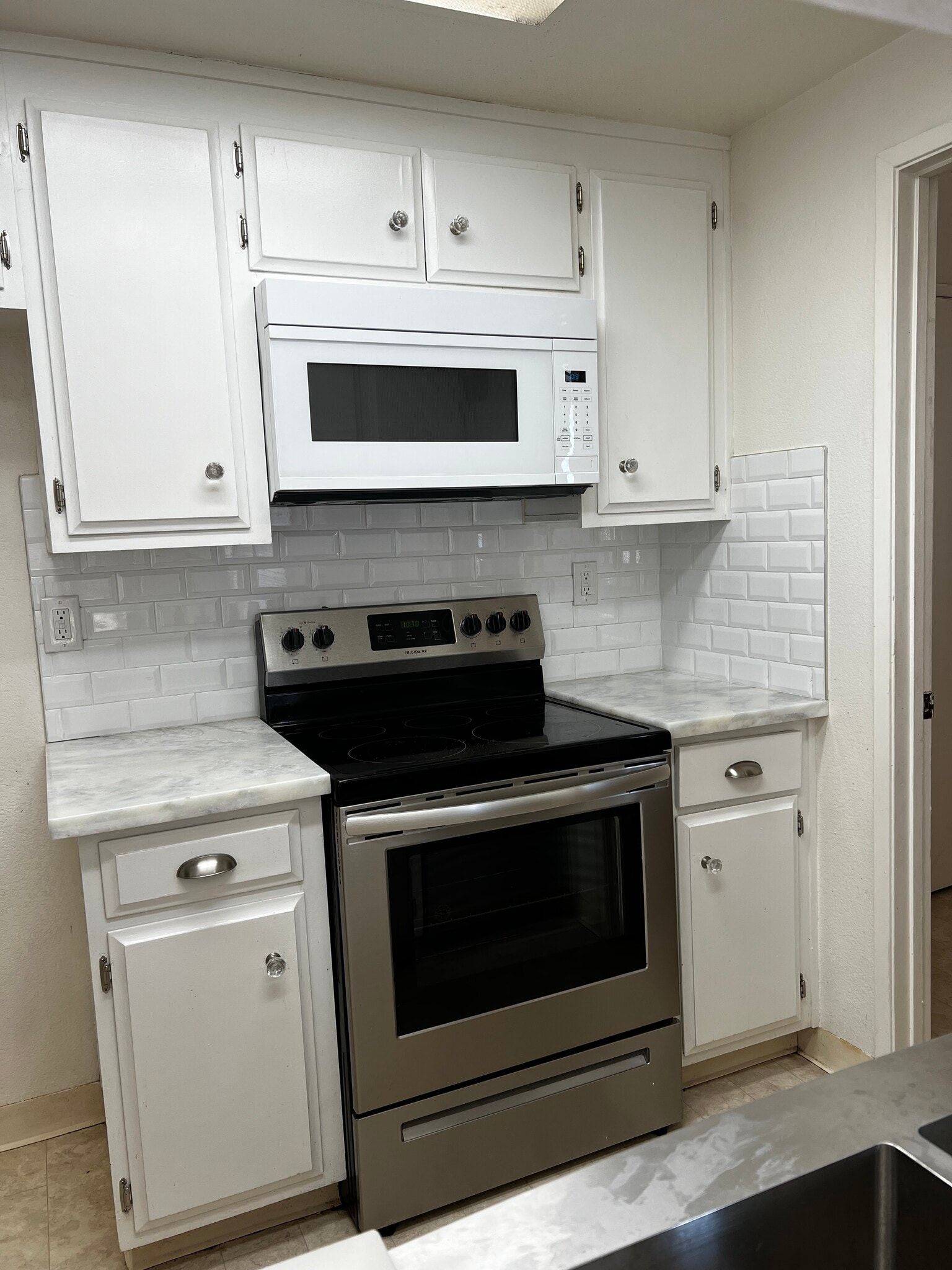 Updated kitchen - 9012 Cornwall Dr