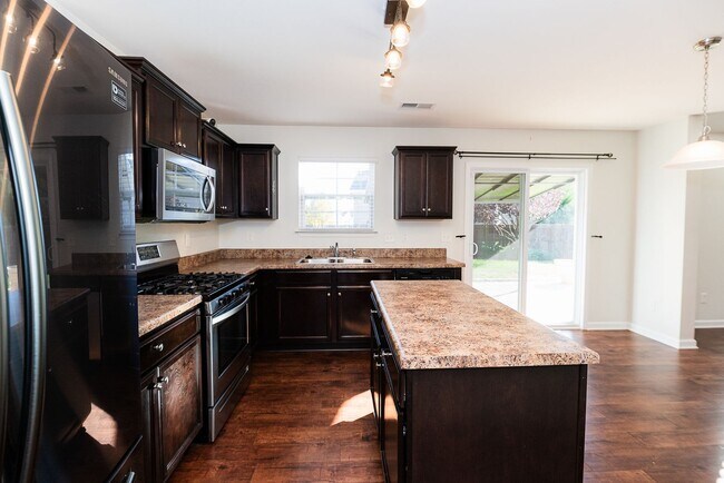 Building Photo - Beautifully 4-bedroom, 2.5-bathroom spacious 2-story home in the Reedy Fork Ranch in Greensboro