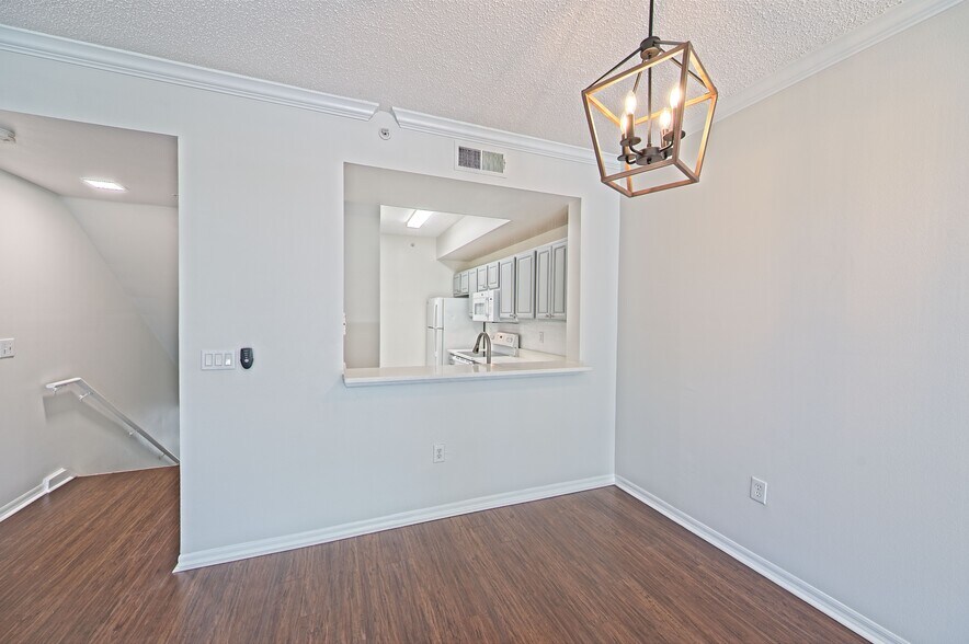 Dining Room with Breakfast Bar - 5701 Bentgrass Dr