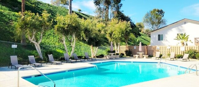 Building Photo - Charming 2BR Retreat with Private Patio, Scenic Views & Resort-Style Amenities