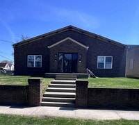 Building Photo - Renovated 2 bedroom 1 bath duplex unit with updated floors, bath, and kitchen!!