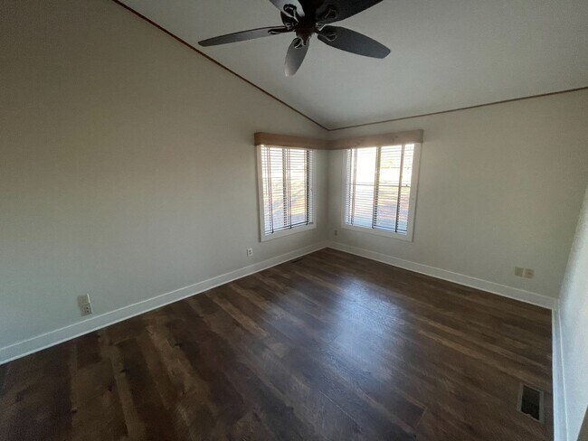 Building Photo - 3 Bedroom 3 Bath Beauty on Golf Course with Wet Bar and Storage Building