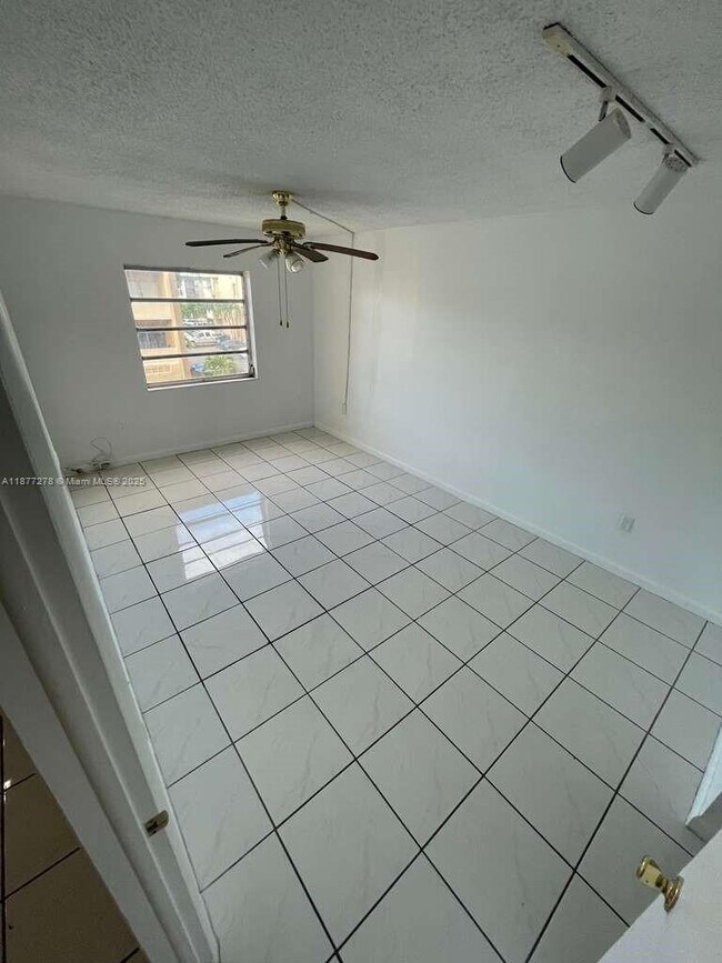 Building Photo - 6095 W 19th Ave