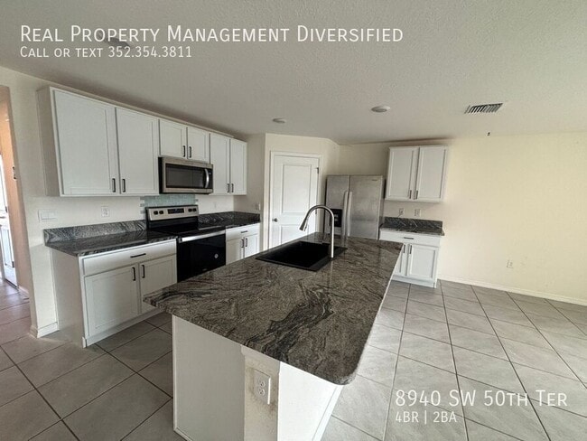 Building Photo - 8940 SW 50th Ter