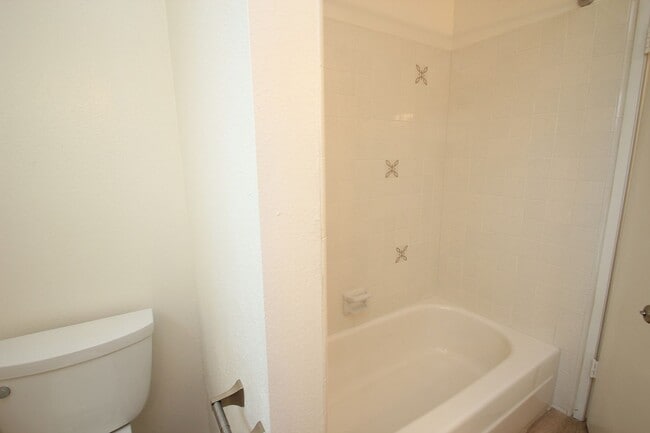 Building Photo - Welcome to this beautifully refreshed 4-bedroom, 2-bath two-story home located in desirable North...