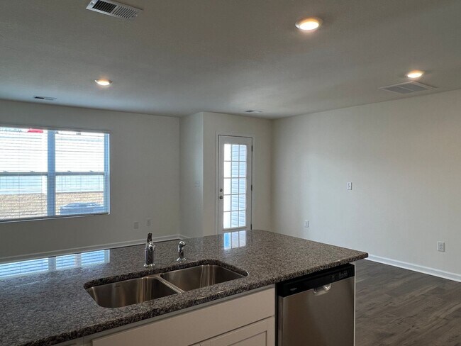 Building Photo - Beautiful New Construction 3 bedroom 2.5 Condo   with garage- Water, trash & sewer incuded!