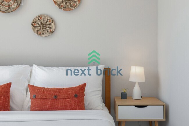 Building Photo - Offer: Unfurnished option available at $3,250, with an optional furnished package for an addition...