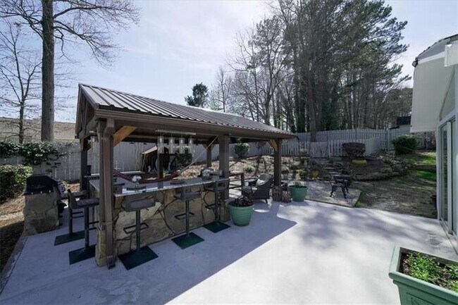 Building Photo - 4 bedroom house in Lawrenceville with cozy...