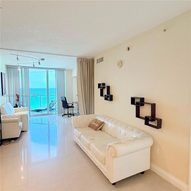 Building Photo - 16699 Collins Ave