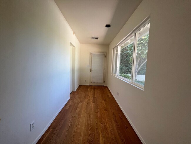 Building Photo - A hidden gem with tree-top view. Tranquil and private. Light and airy