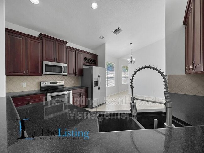 Building Photo - 8814 Sandy Plains Dr