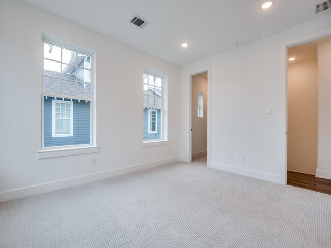 Building Photo - Welcome to a beautiful Craftsman-style end...
