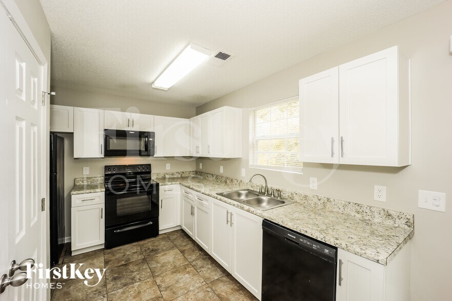 Building Photo - 6763 Merrywood Dr