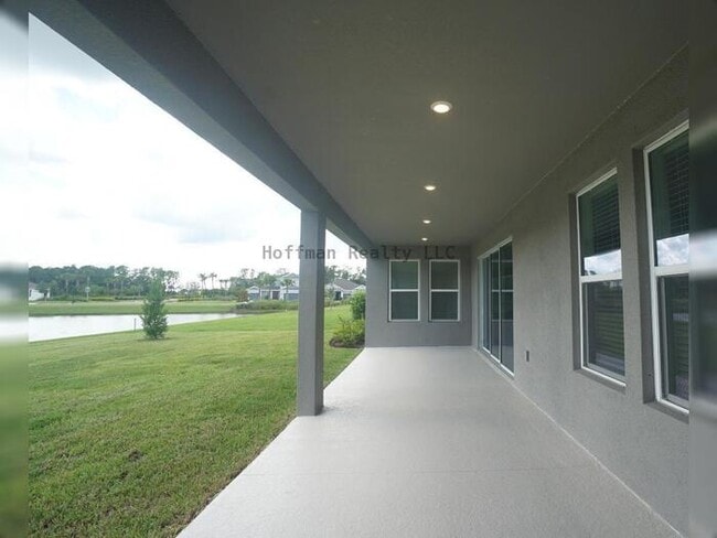 Building Photo - Stunning 5-Bedroom Lakeview Home in River Landing, Wesley Chapel