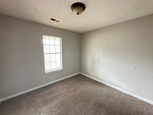 Building Photo - MOVE-IN READY! 3BR/2BA in Quiet Cove | Brick Fireplace | Fenced Yard & Patio!