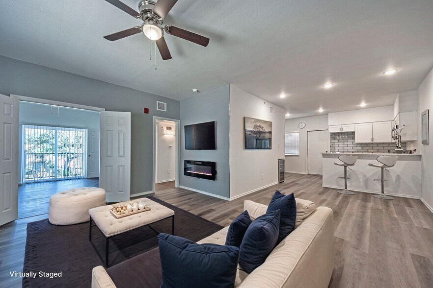 virtually staged photo of living room. - 11234 Park Central Pl